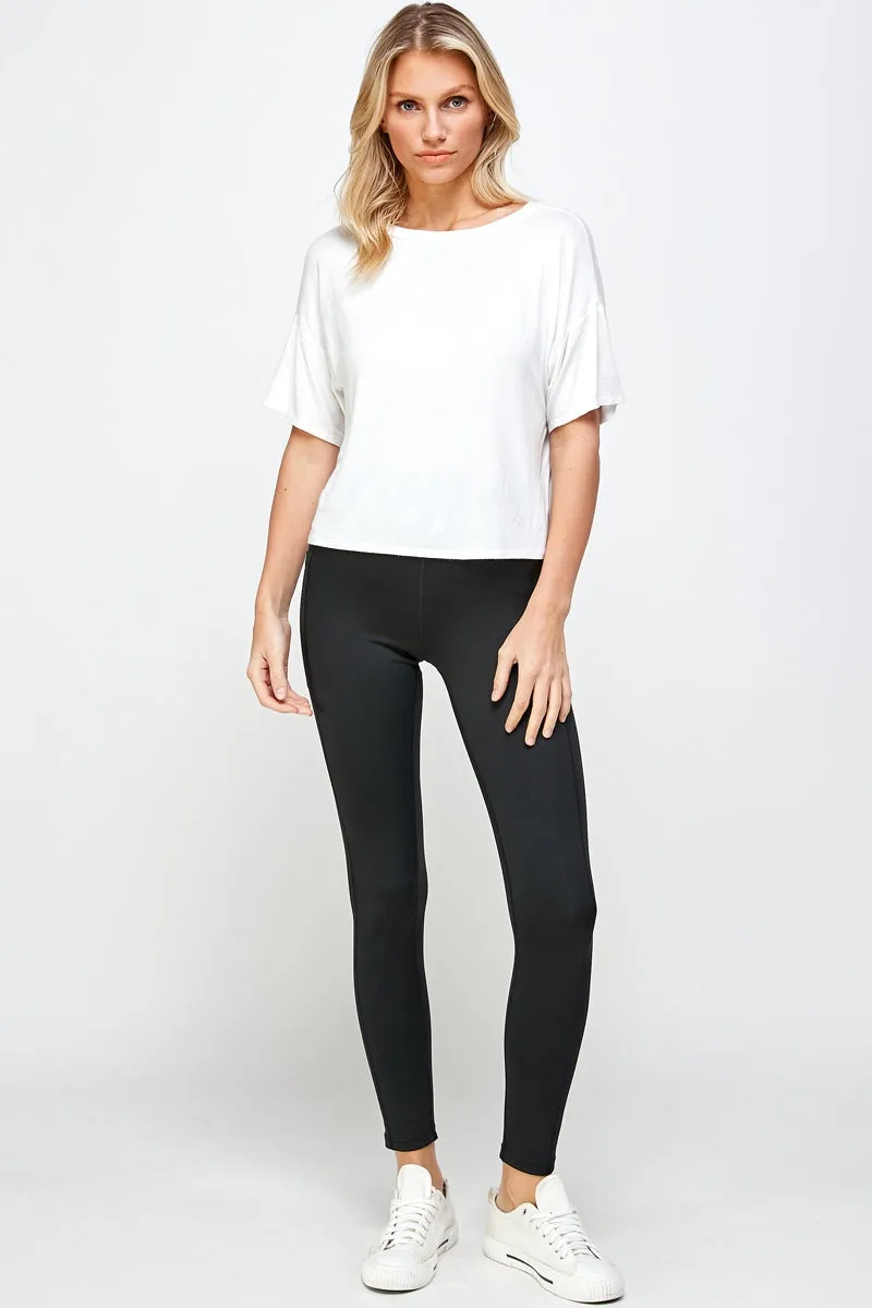 Black stretch leggings with side pockets