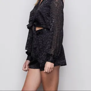 Good American Midnight Leopard Burnout Shorts