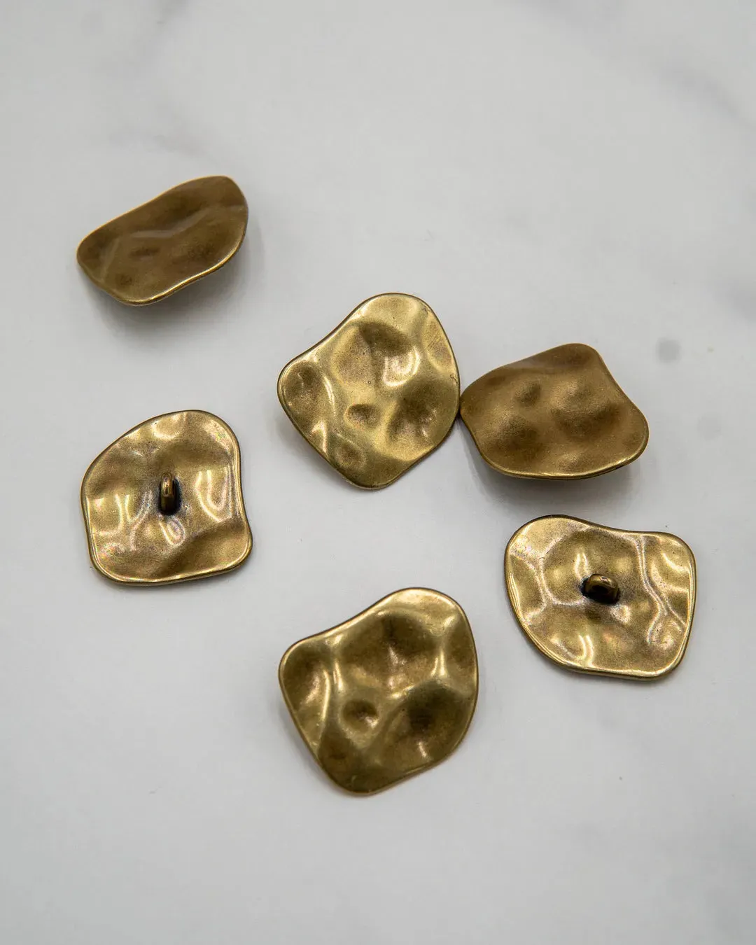 Irregular shaped "old brass" style metal buttons with shank - 1 inch / 25 mm