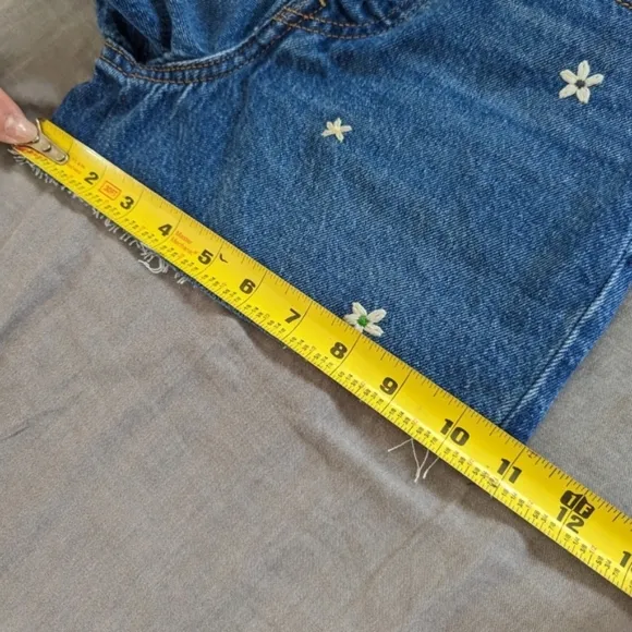 Levi's Ribcage Daisy Flower Embroidered Cutoff Jean Shorts