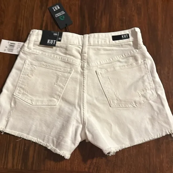 NWT Kut From the Kloth shorts. Size 00. Waist flat 13.5”. Inseam 3”. Rise 10.5”.