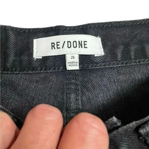 NWT  Re/Done X REVOLVE 70’s High Rise Broken Black distressed hem shorts size 26